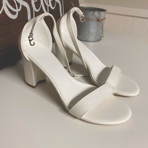 Never worn white heels.